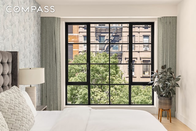 bedroom with multiple windows