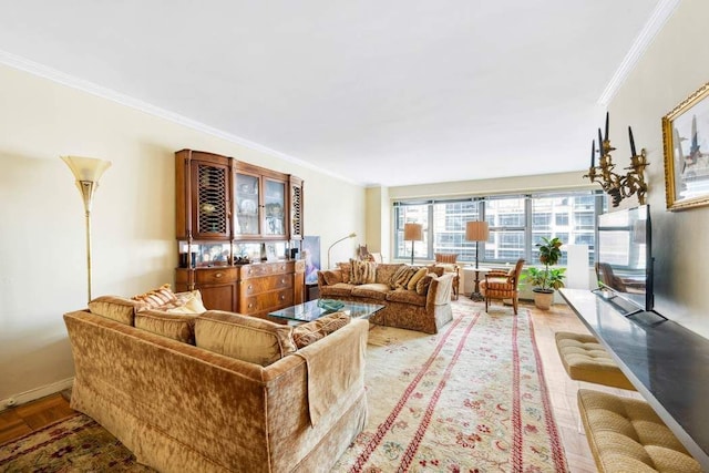 living area with crown molding and light wood finished floors