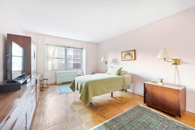 bedroom featuring radiator heating unit