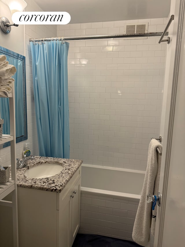 40 W 72nd St Unit 62, New York City, NY 10023 - bathroom with vanity and tiled shower / bath