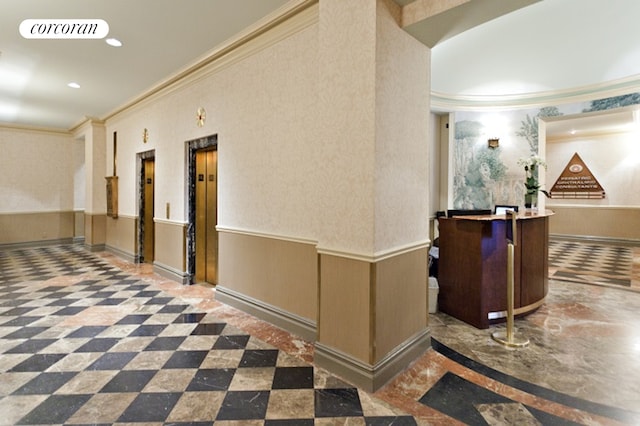 40 W 72nd St Unit 62, New York City, NY 10023 - lobby featuring crown molding, recessed lighting, and wainscoting