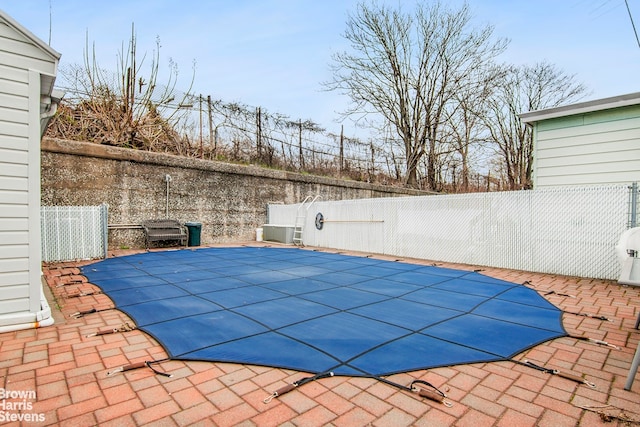 view of pool featuring a fenced in pool, a patio, and a fenced backyard