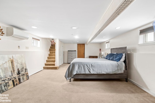 carpeted bedroom with baseboards, recessed lighting, and a wall unit AC
