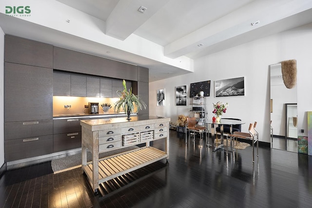 20 Pine St Unit 2207, New York City, NY 10005 - kitchen featuring modern cabinets, dark wood-style flooring, and light countertops