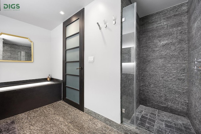 20 Pine St Unit 2207, New York City, NY 10005 - full bathroom featuring tiled shower and baseboards