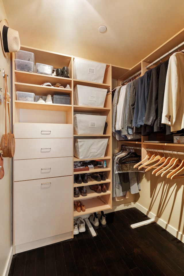 walk in closet featuring hardwood / wood-style floors