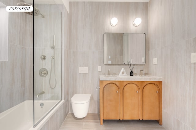 166 Washington Ave Unit 4A, New York City, NY 11205 - full bathroom featuring tile walls, bathing tub / shower combination, and double vanity