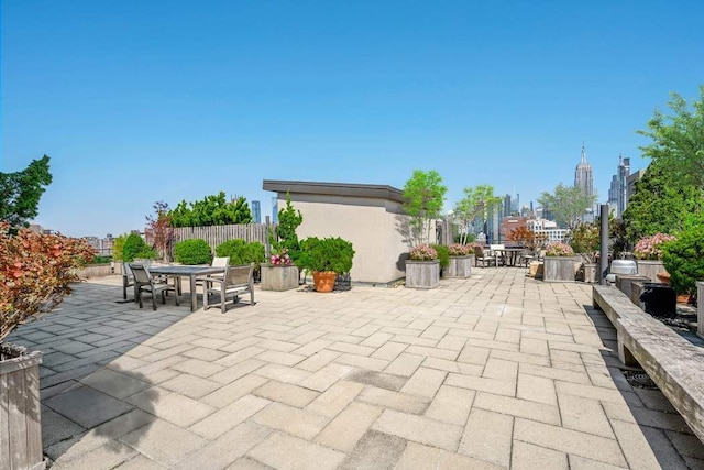 65 W 13th St Unit 9B, New York City, NY 10011 - view of patio featuring outdoor dining area and fence