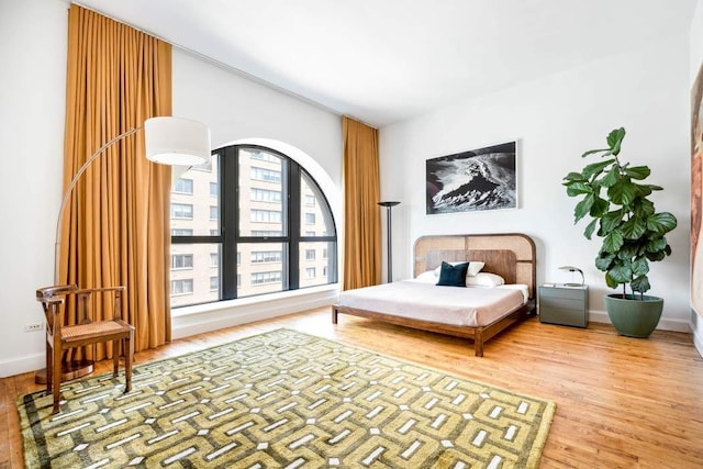 65 W 13th St Unit 9B, New York City, NY 10011 - bedroom with wood finished floors and baseboards