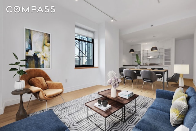 110 Livingston St Unit 9P, New York City, NY 11201 - living area with wood finished floors, track lighting, and baseboards