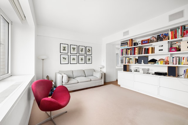 sitting room with visible vents