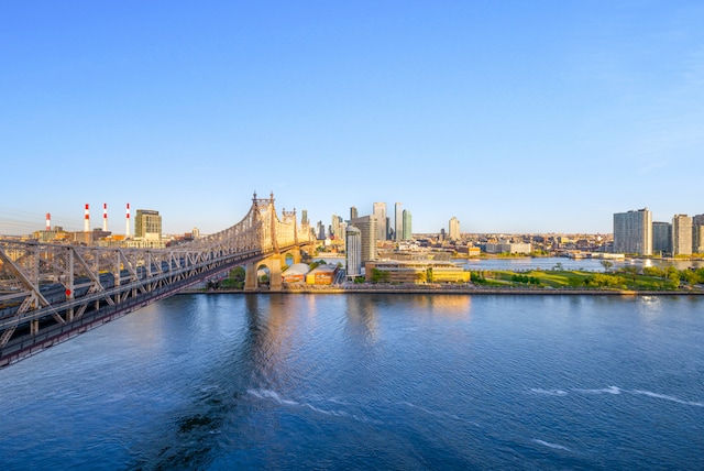 view of water feature with a city view