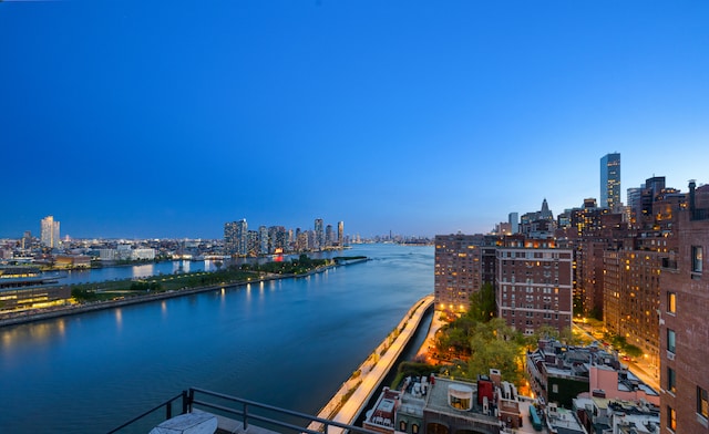 35 Sutton Pl Unit 20A, New York City, NY 10022 - water view featuring skyline and a notable bridge