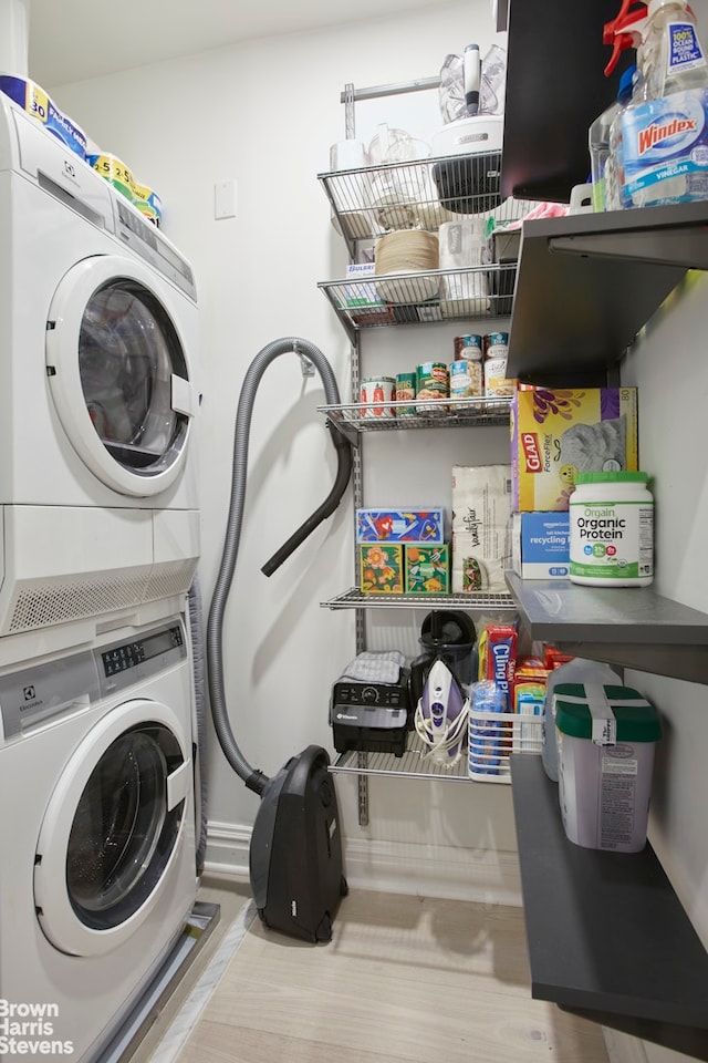 64 E 94th St Unit 4C, New York City, NY 10128 - laundry room with estacked washer and dryer