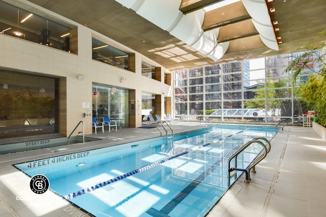 70 Little W St Unit 5C, New York City, NY 10280 - indoor community pool featuring a patio area