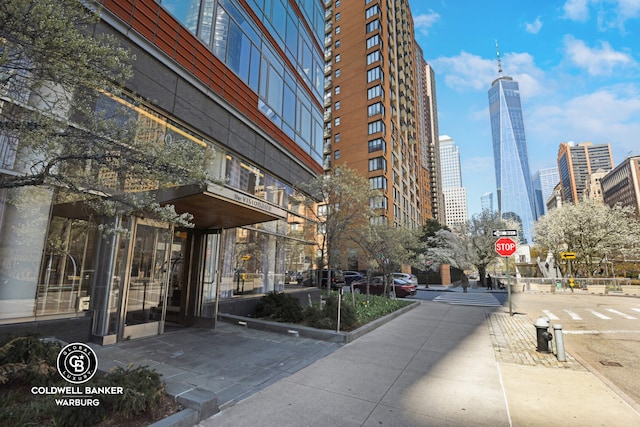view of property with a city view