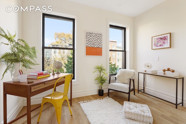 198 Madison St Unit Sf, New York City, NY 11216 - sitting room with light wood-type flooring and baseboards