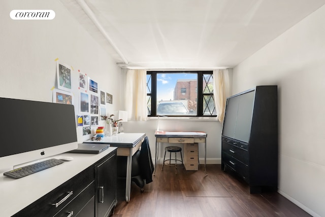 home office featuring baseboards, dark wood finished floors, and visible vents