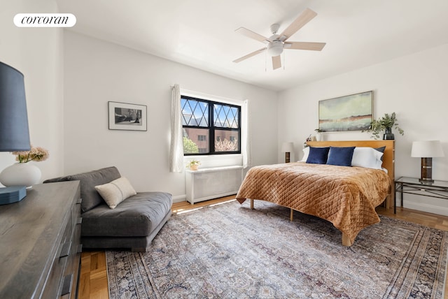 bedroom with baseboards, ceiling fan, and visible vents