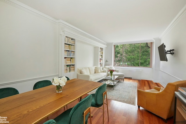 101 W 79th St Unit 2G, New York City, NY 10024 - living area featuring ornamental molding, wood finished floors, and built in shelves