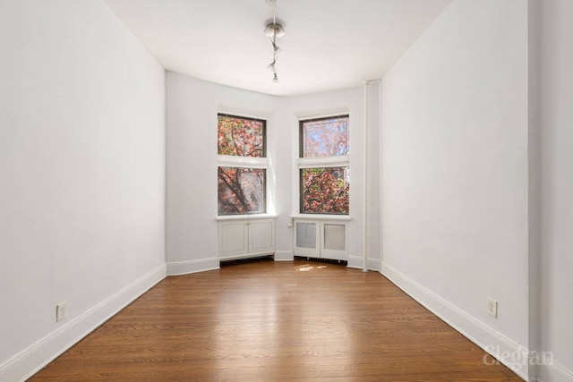 175 Amity St Unit A4, New York City, NY 11201 - spare room with wood finished floors and baseboards