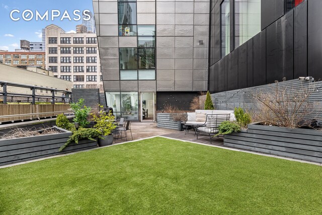 245 10th Ave Unit 2W, New York City, NY 10001 - view of yard featuring a garden