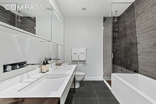 245 10th Ave Unit 2W, New York City, NY 10001 - bathroom featuring a shower stall, tile patterned flooring, double vanity, and a bath