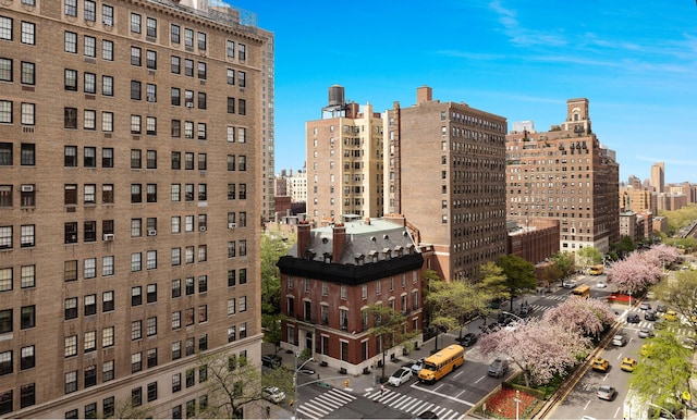 1165 Park Ave Unit 10A, New York City, NY 10128 - view of property featuring a skyline view and cooling unit