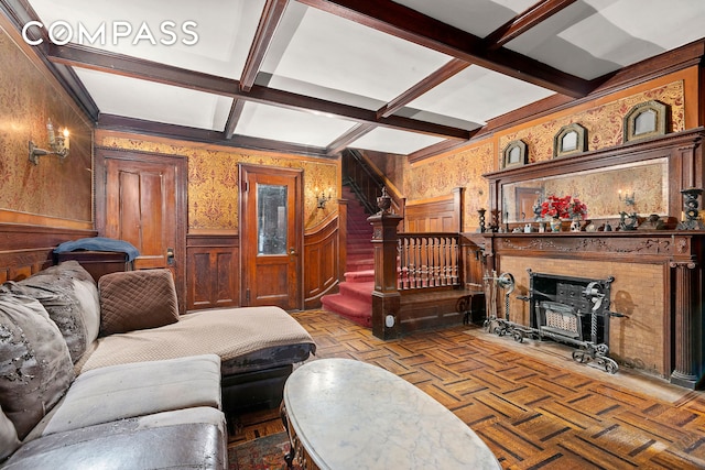 32 W 85th St, New York City, NY 10024 - living area with stairway, coffered ceiling, beam ceiling, and a wainscoted wall