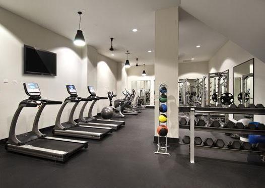 exercise room with recessed lighting