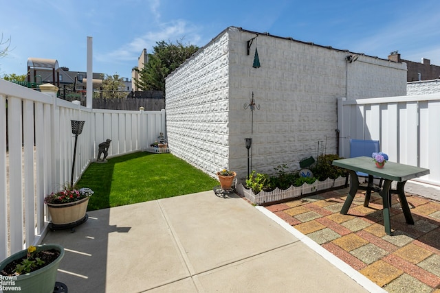 view of patio with a fenced backyard