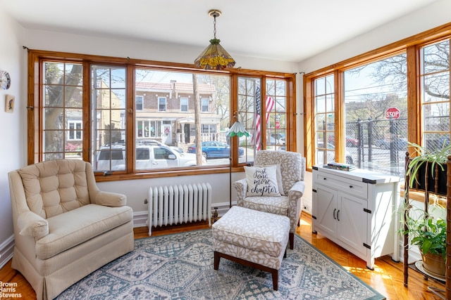 626 81st St, New York City, NY 11209 - sunroom / solarium featuring radiator heating unit and baseboards