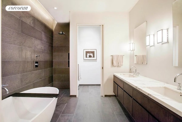 63 Greene St Unit Loft4D, New York City, NY 10012 - bathroom featuring a soaking tub, double vanity, and a tile shower