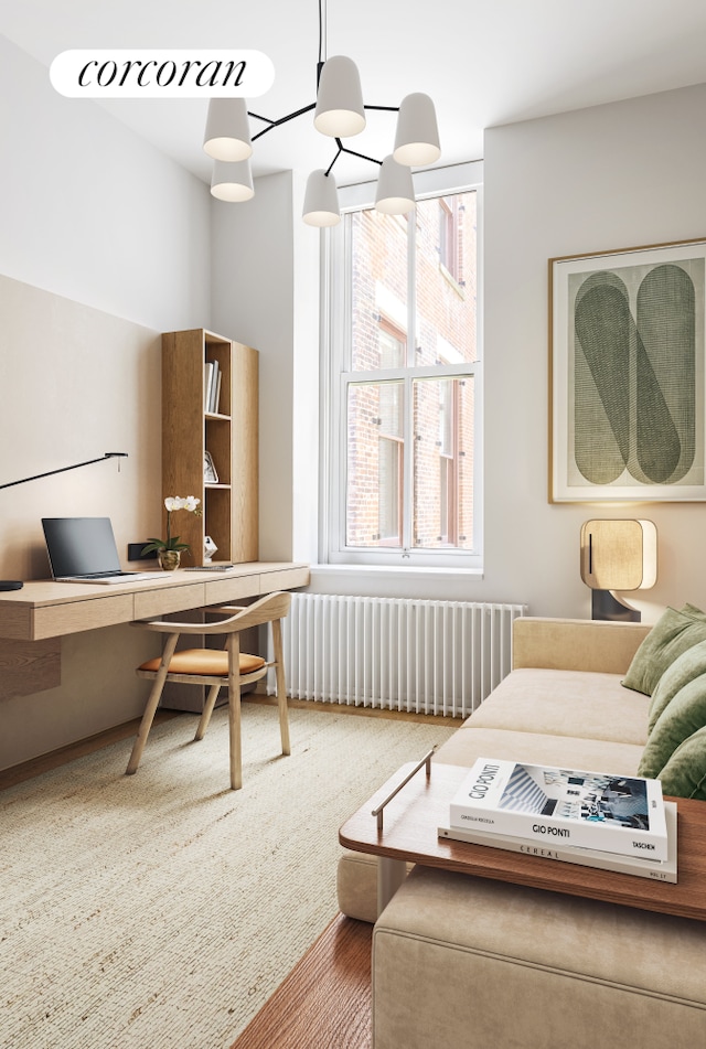 63 Greene St Unit Loft4D, New York City, NY 10012 - office area featuring radiator heating unit and healthy amount of natural light