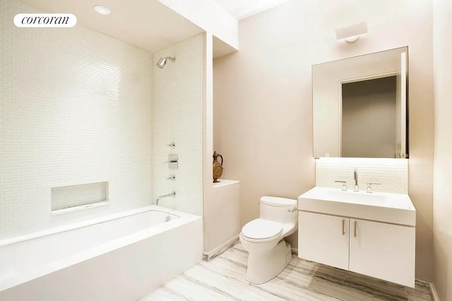 63 Greene St Unit Loft4D, New York City, NY 10012 - bathroom featuring shower / bath combination, vanity, and backsplash