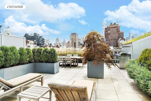 63 Greene St Unit Loft4D, New York City, NY 10012 - view of patio with a skyline view, outdoor dining space, and an outdoor hangout area
