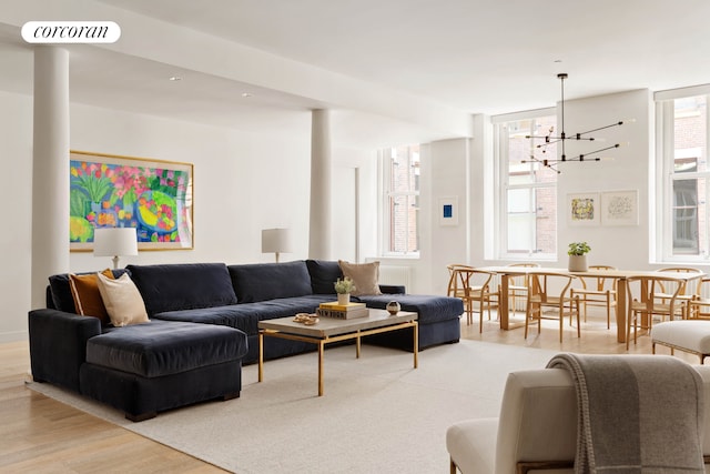 63 Greene St Unit Loft4D, New York City, NY 10012 - living area with a chandelier and wood finished floors