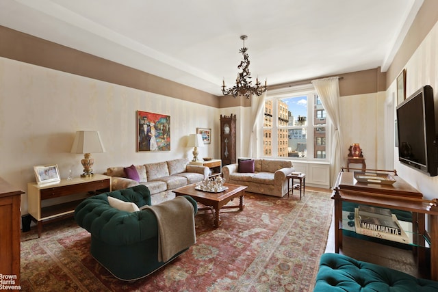 living room featuring a notable chandelier