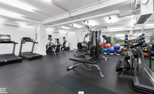 gym with a wall mounted air conditioner