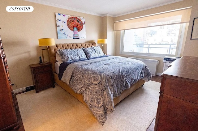 303 E 57th St Unit 16F, New York City, NY 10022 - bedroom featuring ornamental molding and baseboards