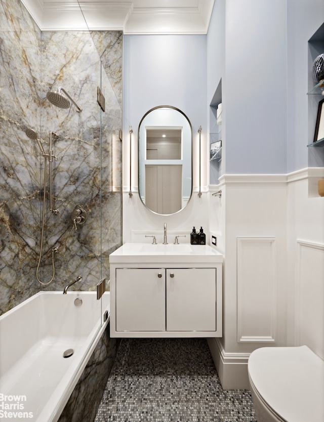 full bath featuring shower / bathtub combination, toilet, ornamental molding, and vanity