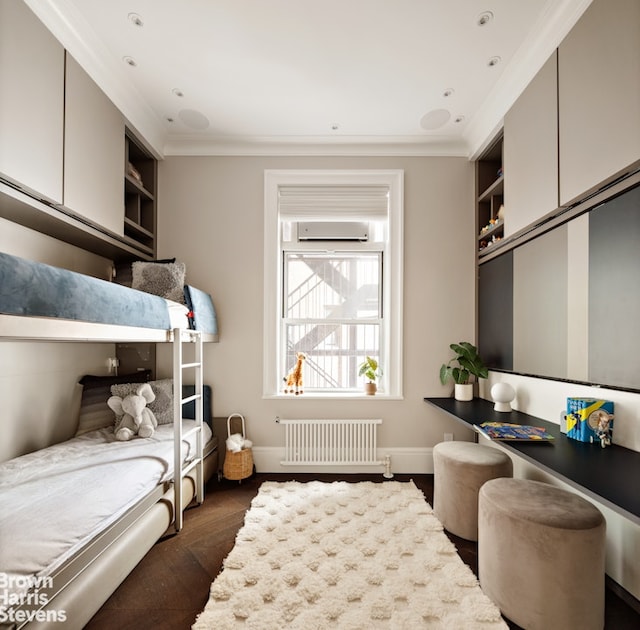bedroom featuring crown molding, dark wood-style flooring, and radiator