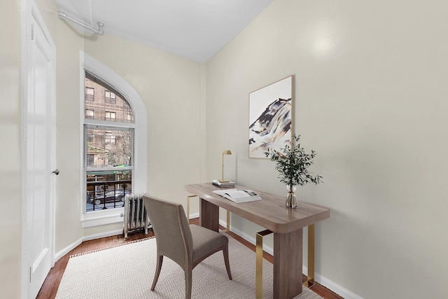 505 W End Ave Unit 2-B, New York City, NY 10024 - office area featuring radiator, wood finished floors, and baseboards