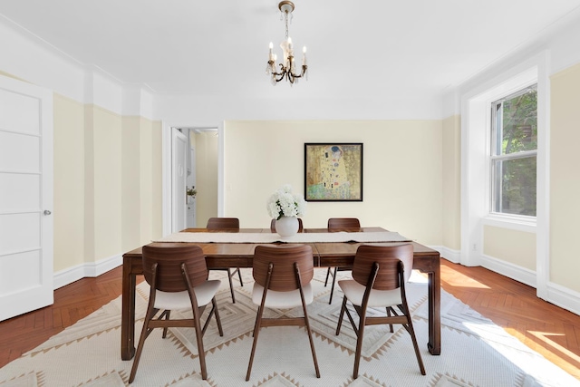 505 W End Ave Unit 2-B, New York City, NY 10024 - dining space with a chandelier and baseboards