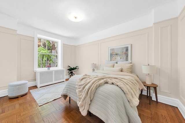 505 W End Ave Unit 2-B, New York City, NY 10024 - bedroom featuring radiator and a decorative wall