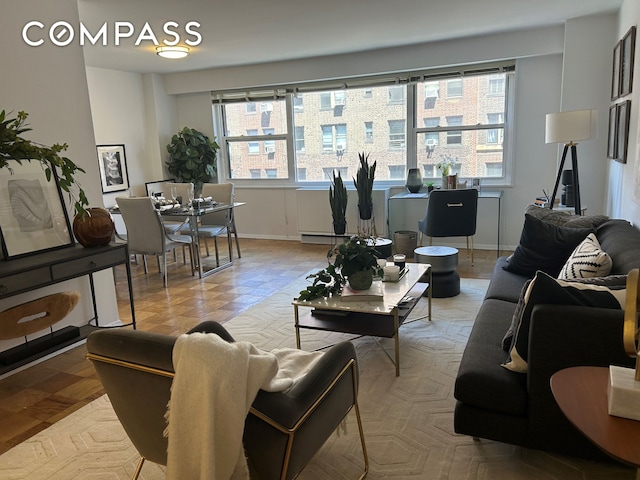 400 E 54th St Unit 15E, New York City, NY 10022 - living area with plenty of natural light and baseboards