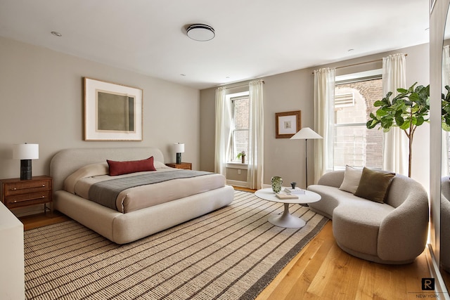 bedroom with wood finished floors