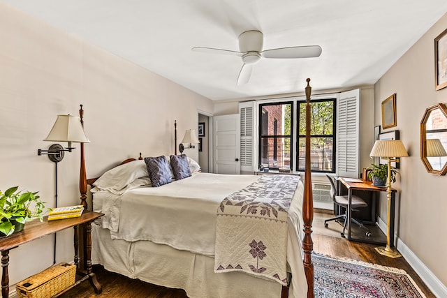 bedroom featuring baseboards, a ceiling fan, and wood finished floors