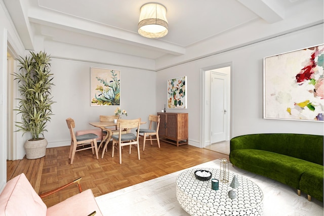 dining area with baseboards and beamed ceiling