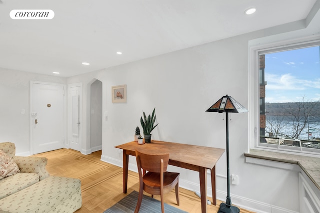 250 Cabrini Blvd Unit 3C, New York City, NY 10033 - home office featuring arched walkways, baseboards, and recessed lighting